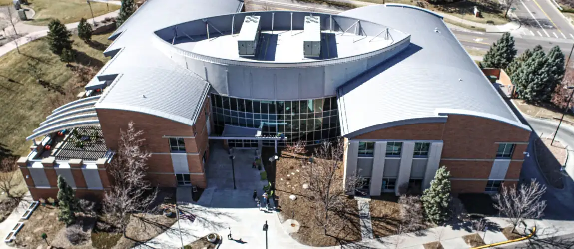 Aerial view of a modern brick and metal building